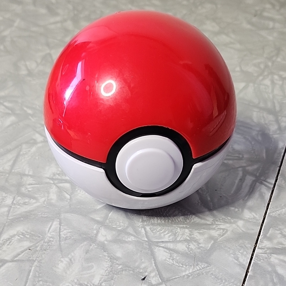 Red and White Poké Ball Toy